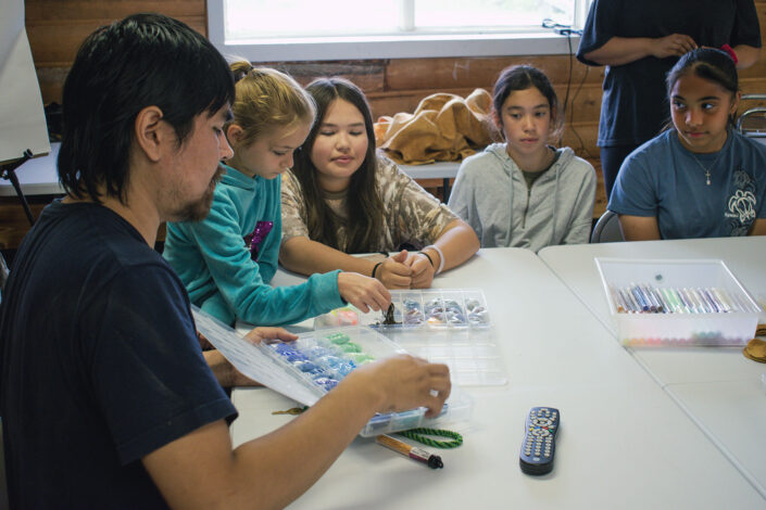 Beading at Culture Camp.