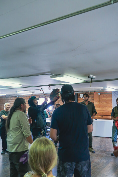 Photo of a group from Culture Camp in a dance circle.