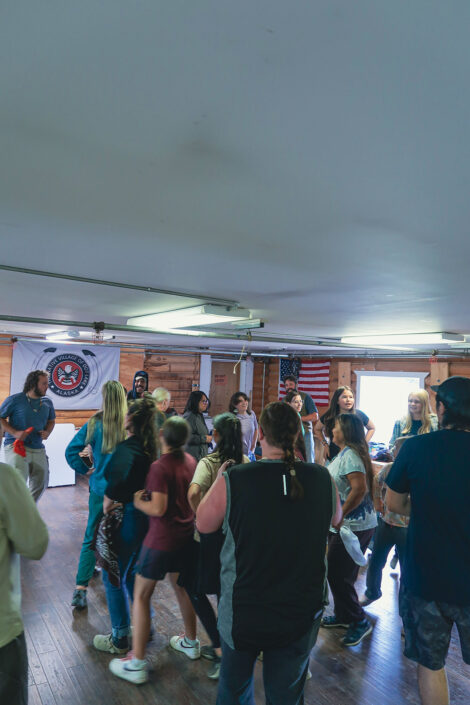 Photo of a group from Culture Camp in a dance circle.