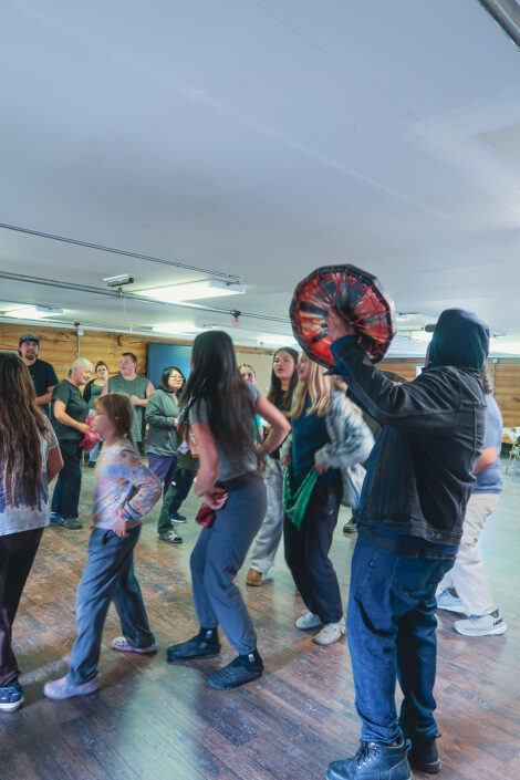 Photo of a group from Culture Camp in a dance circle.